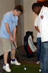 On the way home, some of the team waited in the Crown Room for a few hours.  The putting green provided much entertainment.