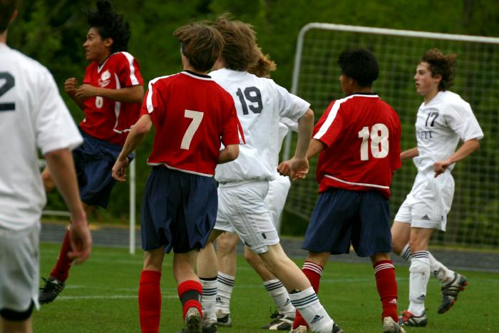 Andrew heads in Goal 3 (behind Adam)