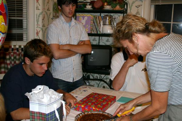 Deb cuts Frank's birthday cake