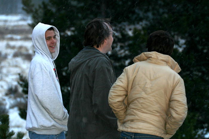 The boys check out the elk